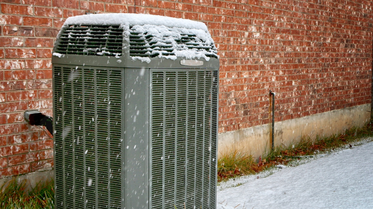 heating winter-snow-covered-air-conditioner